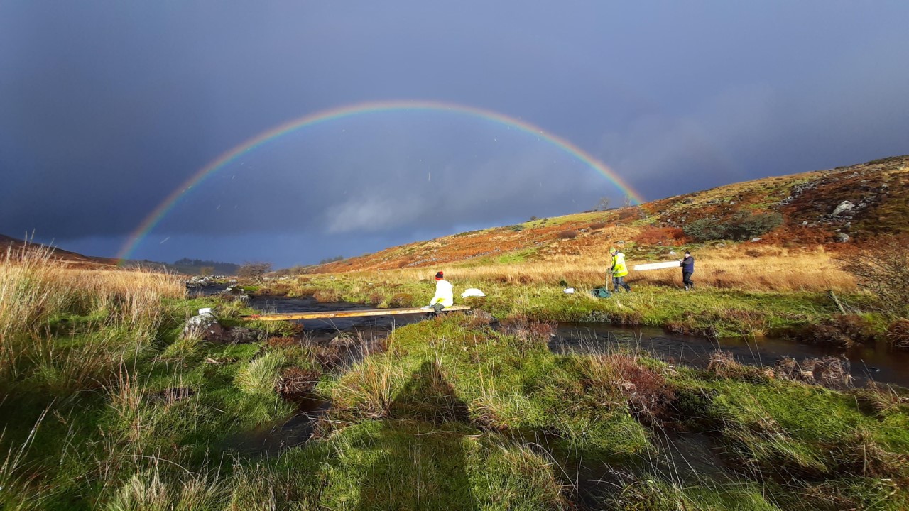 Rainbow over RSS particpants carrying out maintenance along the Duhallow Way